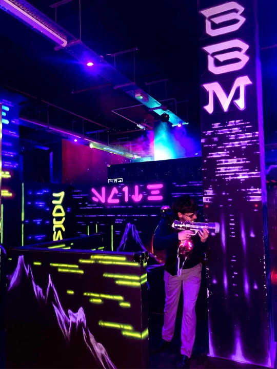 man playing laser quest at woking superbowl